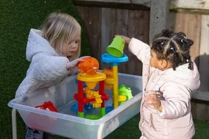 Jumpers nursery children playing